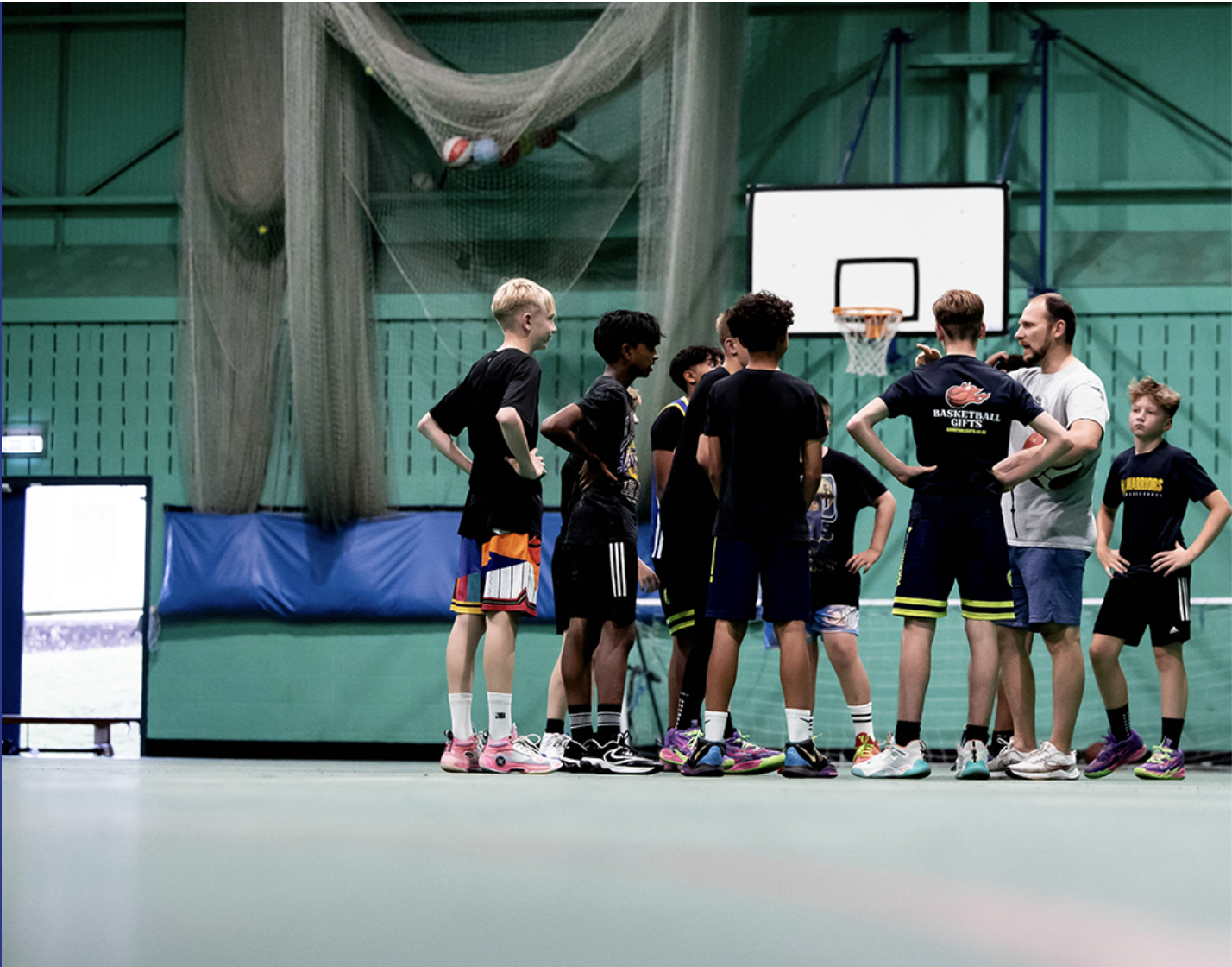 A Medway coach talking tactics with his youth team.